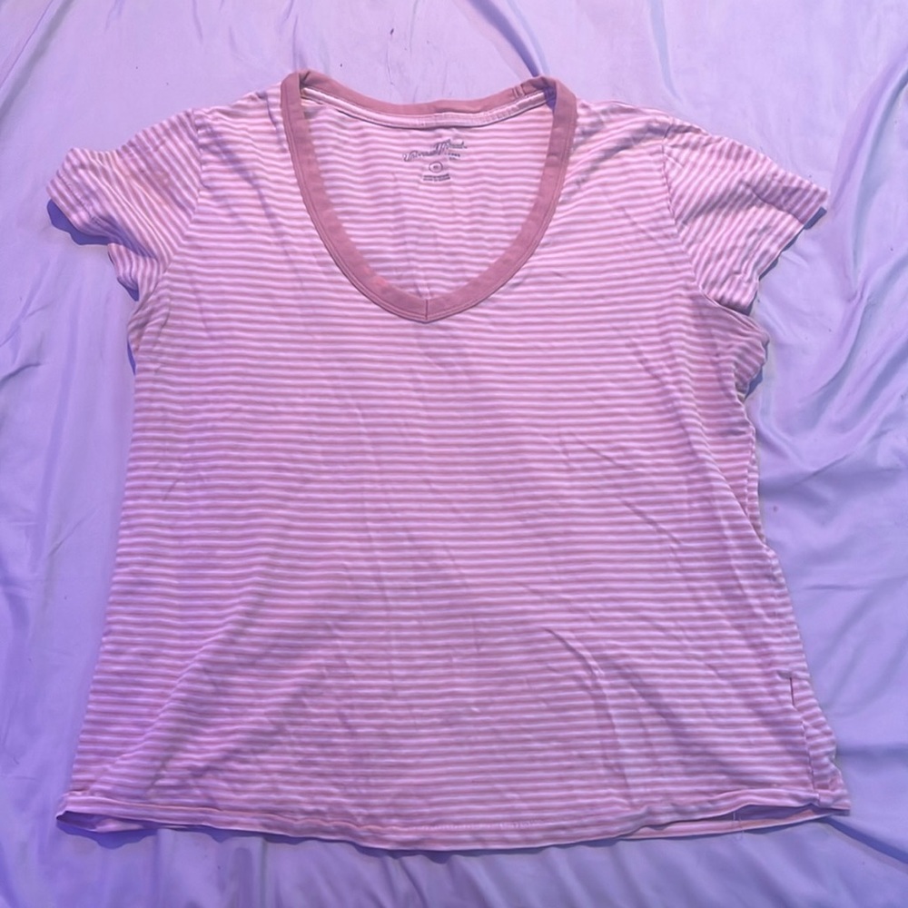 A pink stripped shirt